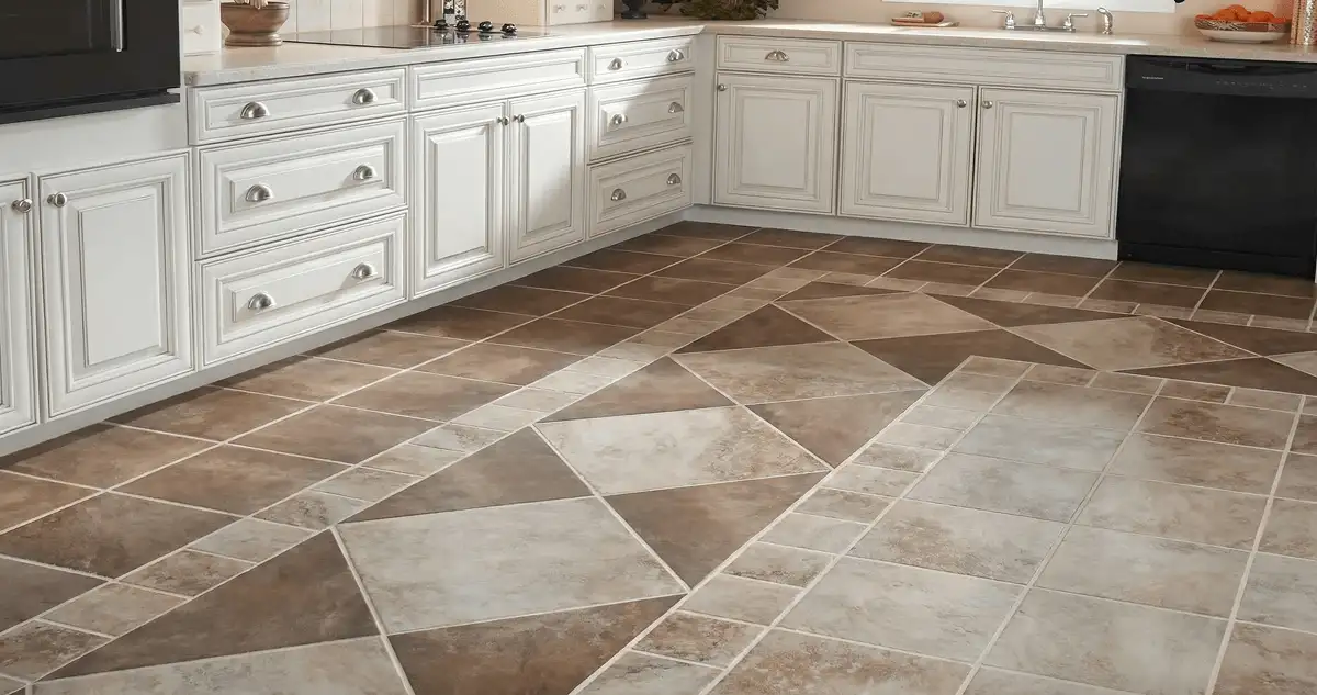 Kitchen with white cabinets and a professionally installed tile floor in Huntsville, AL